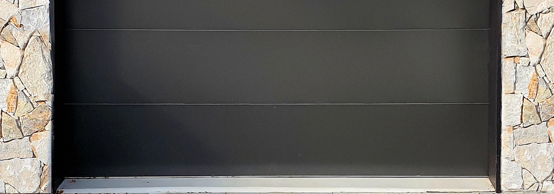Overhead Black Garage Door Installation in Wellington, Florida