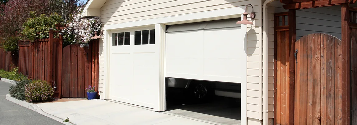 Fix Metal Garage Door Jerking in Wellington, Florida